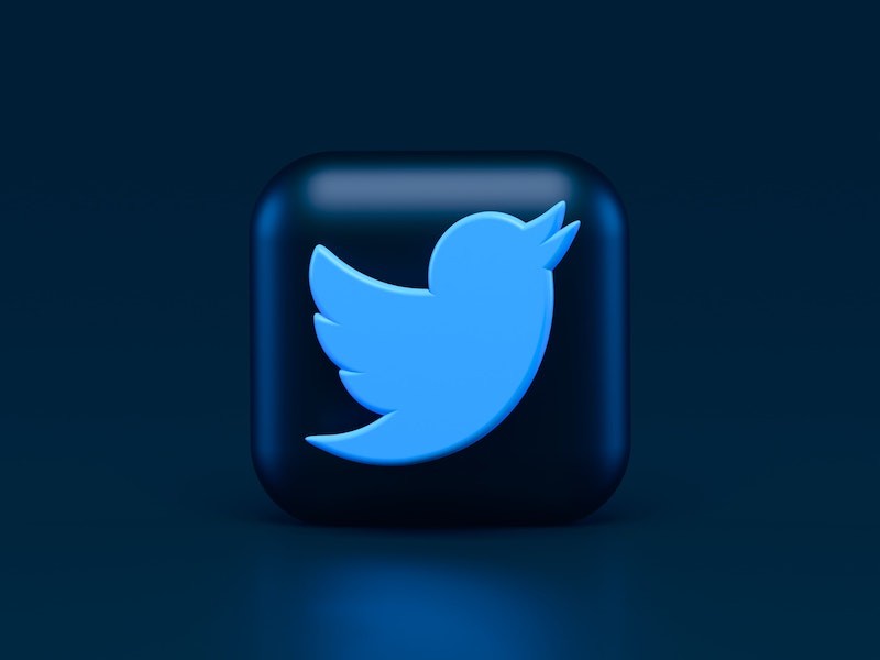 Twitter logo on dark blue background