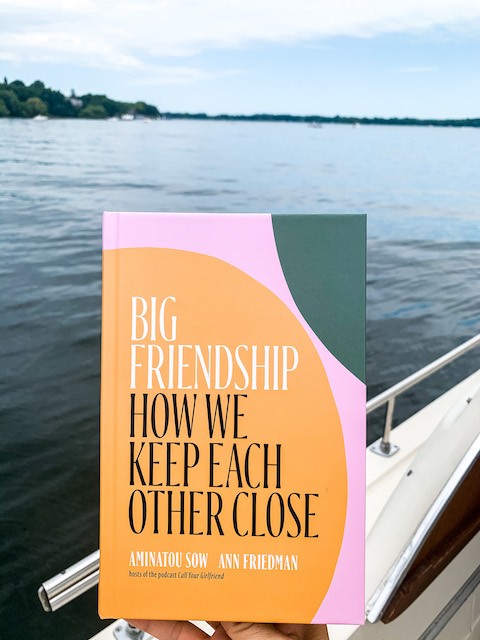 book cover of big friendship on a boat with water in the background